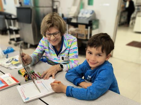 Picture of student with a reader