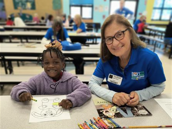 Picture of student with a reader