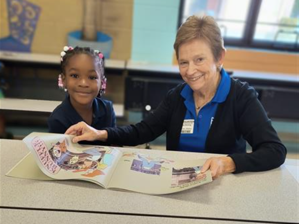 Picture of student with a reader